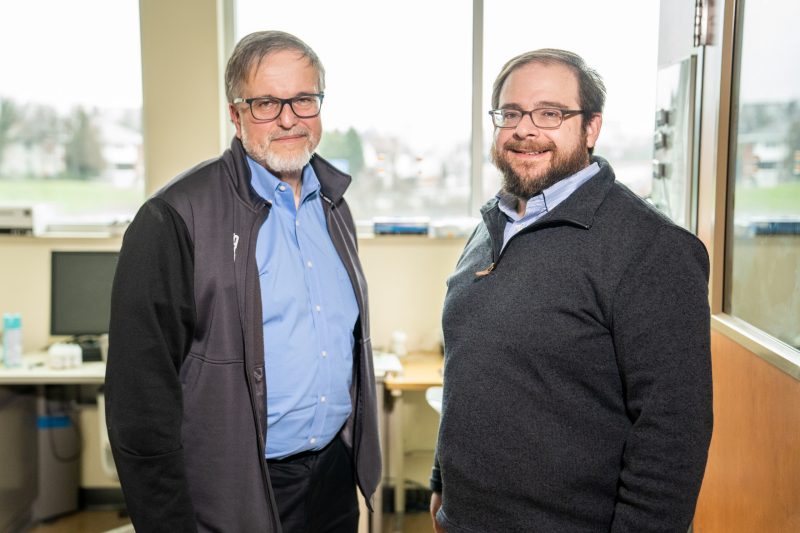 Fralin Biomedical Research Institute at VTC scientists Warren Bickel (left) and Stephen LaConte (right) standing side by side.