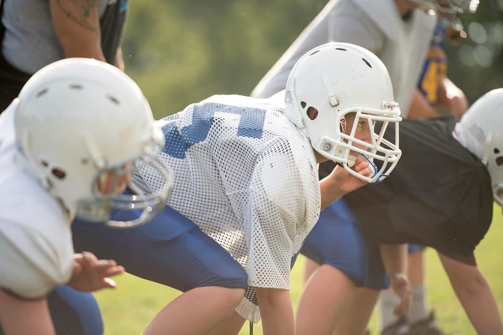 Football helmet with liquid padding may prevent concussions