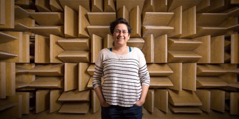 Nicole Abaid pictured in the anechoic chamber in Durham Hall at Virginia Tech.