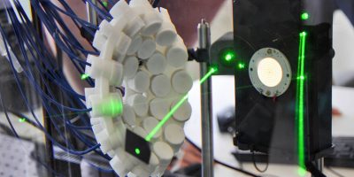 A machine with a bright green laser 