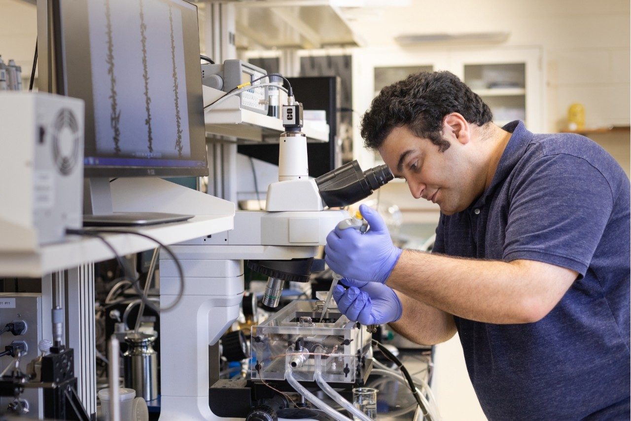 Doctoral student Farzad Ahmadi sets up a scale model of a passive anti-frosting surface