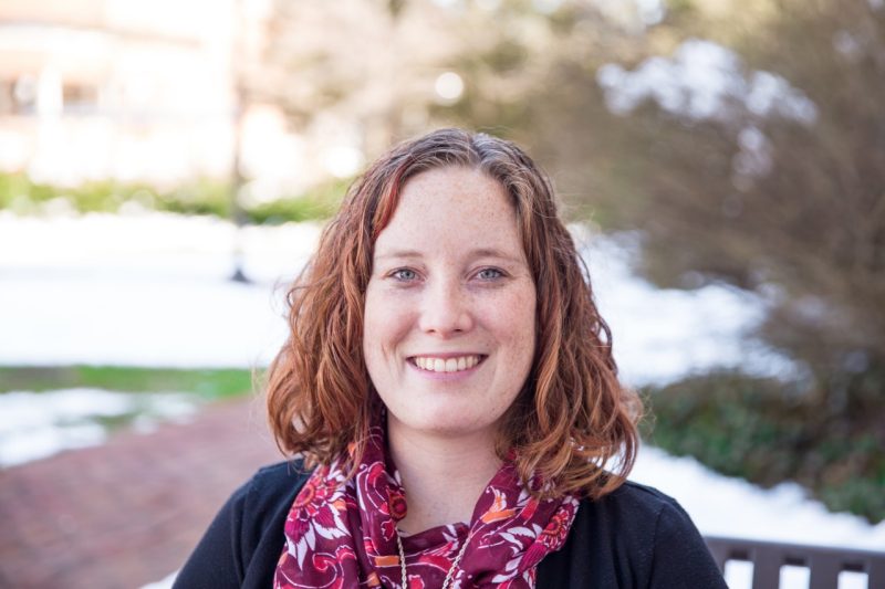 Photograph of Alexandra Hyler, 2018 Graduate Student of the Year, seated in front of the Graduate Life Center