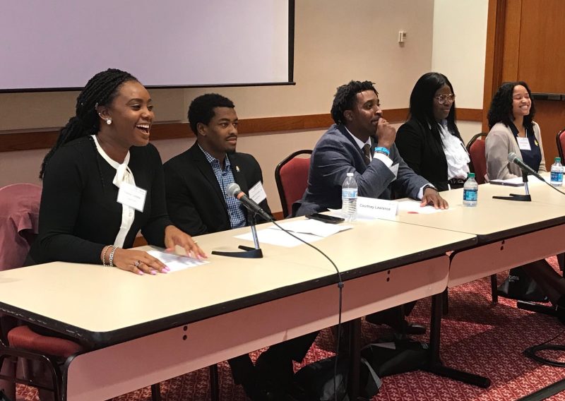 Graduate student Trichia Cadette laughs as she responds to a student during a panel discussion. Also pictured: Wendell Grinton, Jr.; Courtney Lawrence; Janay Frazier; and Lauren Blackwell